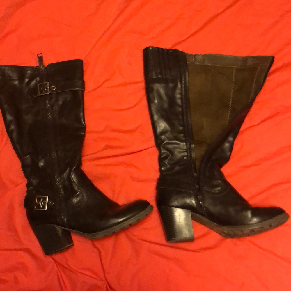 Nice used black -white mountain brand boots